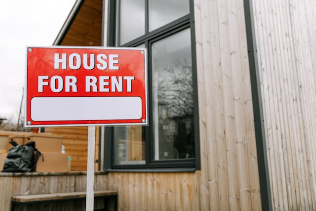 House for rent Sign on lawn